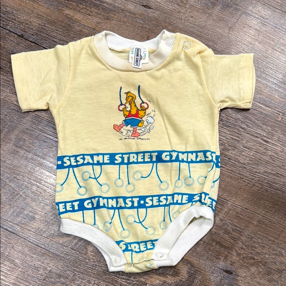 Vintage Sesame Street Yellow Gymnast Kids One Piece size 1/2 (3-6m) JC Penney